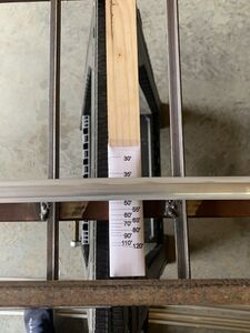 Step 2: Read the radius of the rail from the Sagitta Rule. In this photo the rail has a curve approximating a 50 foot radius.