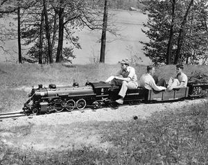 David Booth works the throttle of live steamer at Tipsico Lakeshore Railroad.