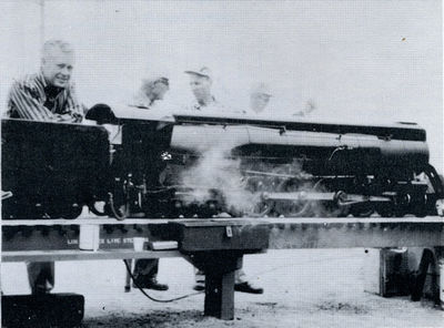 Richard Priest firing up his 1-1/2 inch scale 4-8-4 at Los Angeles Live Steamers Golden Spike ceremony, May 5, 1957.