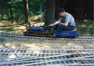 At Nick Edwards' 1986 Gold Spike Meet, Bill VanBrocklin Jr. running #28, a 1-1/2 inch scale 4-4-0. (October, 1986 at Nashua, NH. Photo by John Kurdzionak).