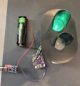 A signal running SigOS software on the small computer board in the center. The signal head is by Ron Light. October 2025.