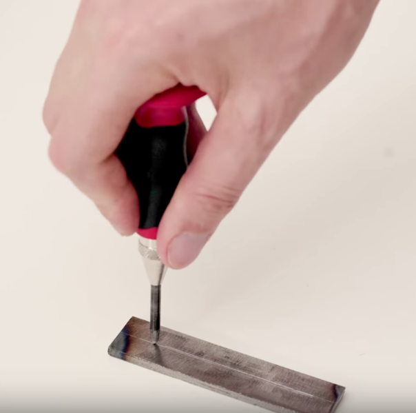 File:Wintergatan center punch for drilling hole.PNG