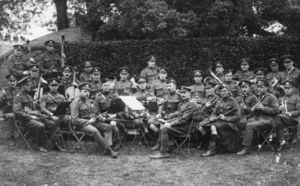 Victor is in the third row, directly behind the white sheet music, with his left hand on the upper portion of his Viola.