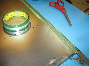 This is the roll of rivet tape. The green part is adhesive and the clear part is, well, not adhesive.