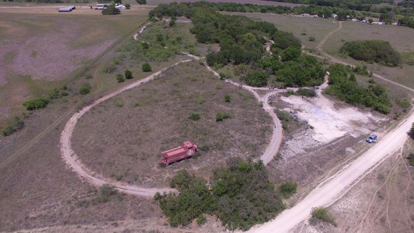 The big loop on the west end of the Comanche & Indian Gap RR. The area covered by trees next to the caboose is Tlaquepaque. Mexican hat is to the right, just to the right of the wye. The HEWT starts on the left side of the wye. Curving to the left from Tlaquepaque you reach summit, then straighten into Anasazi, then continue to cross the HEWT and on to Gotebo. After crossing the CIG, the HEWT moves to the left and then up into West Yard and Springerville. You can just make out Indian Gap and the Pickard homestead in the upper right of the photo.