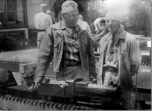 Harry Dixon & Carl Purinton at GGLS Redwood Regional Park, Oakland, California. The locomotive is Carl’s “Red Hen” before his daughter painted a hen on the cab.