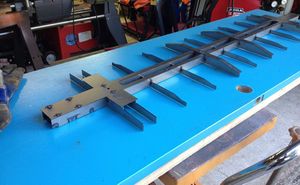 Rick White commented: From the looks of this, the way it is set up now will work for MCC trucks. Have to add a plate of 3/8 inch thickness for Thomas Bee trucks. If you want brakes, make sure the plate is only 7.15 inches long. Longer and it can hit the brake shoes. Also, minimum length determined by the truck design.