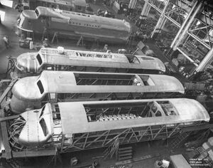 In 1937 the Chicago Rock Island & Pacific Railroad began operating streamlined passenger trains on select routes. To power these trains the Rock Island bought six TA locomotives (numbered 601-606) from the Electro Motive Company. This phot shows four of these locomotives under construction at the EMC plant in La Grange, Illinois. EMC Builder's photo, Cliff Downey collection.