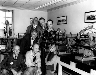 Lester Friend's home shop, Danvers, Mass., 1949. Front right to left: Art Wegner, Ray Peck, Lester Friend's daughter. Bending over: Lester Friend. At right behind: Al Milburn. Photo by A.W. Leggett.