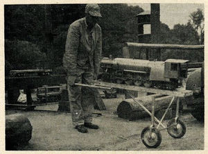 Carrying the engine over to the track, which has an opening at the transfer table.