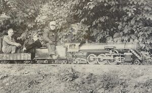 Horace Shaw at the throttle of 4-6-2 Pacific on his Whysall Light Railroad, Summer 1938. Seated behind him is Hugh Pettis, son of Cliff Pettis of Houston, Texas. Photo by Cliff Pettis. From Live Steam Magazine, March 1979.