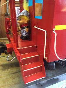 Narrow strips of white vinyl are applied to the top edge of each step for "safety".