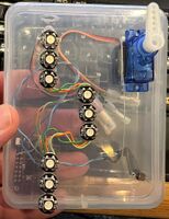 Prototype test box shows how multiple WS281 LEDs can be daisy chained together. In this case there are 3 signal heads, each with 3 LEDs.