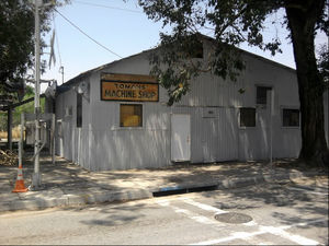 This building at Rialto Street and I Street was the former location of Charles Linderoth’s Machine Works, where the Gentry-Lewis V8 engines were machined and assembled.