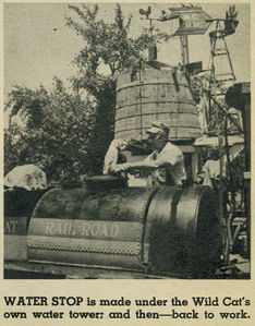 Water stop is made under the Wild Cat's own water tower; and then--back to work.